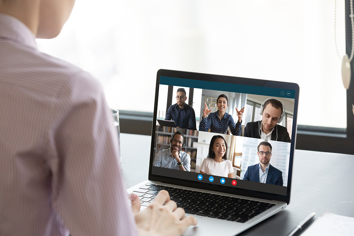 Office worker on voice call at desk